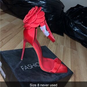 Size 8 red heels never used new in box